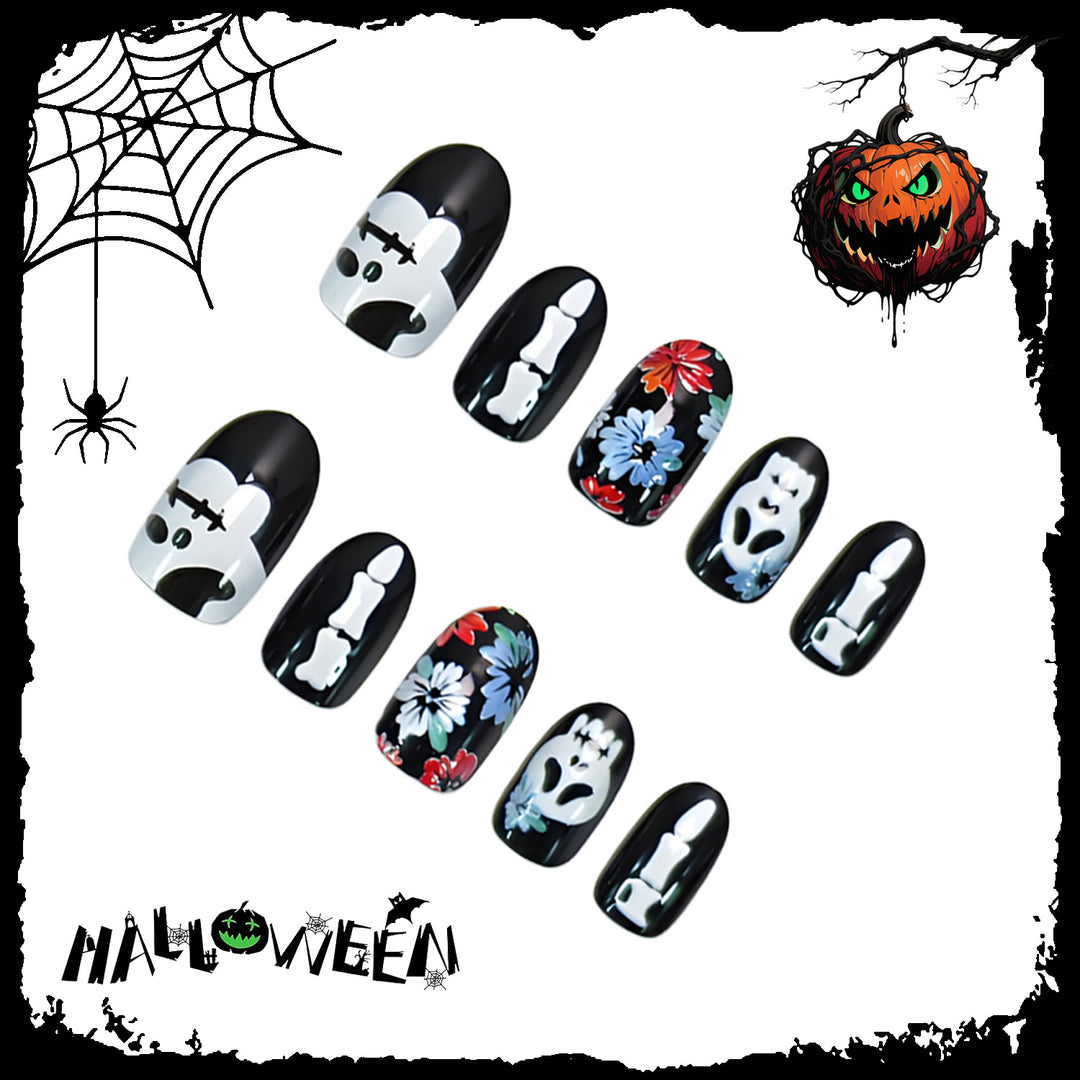 Kunstnagelset mit gruseligen Halloween-Motiven und floralen Verzierungen Karnz