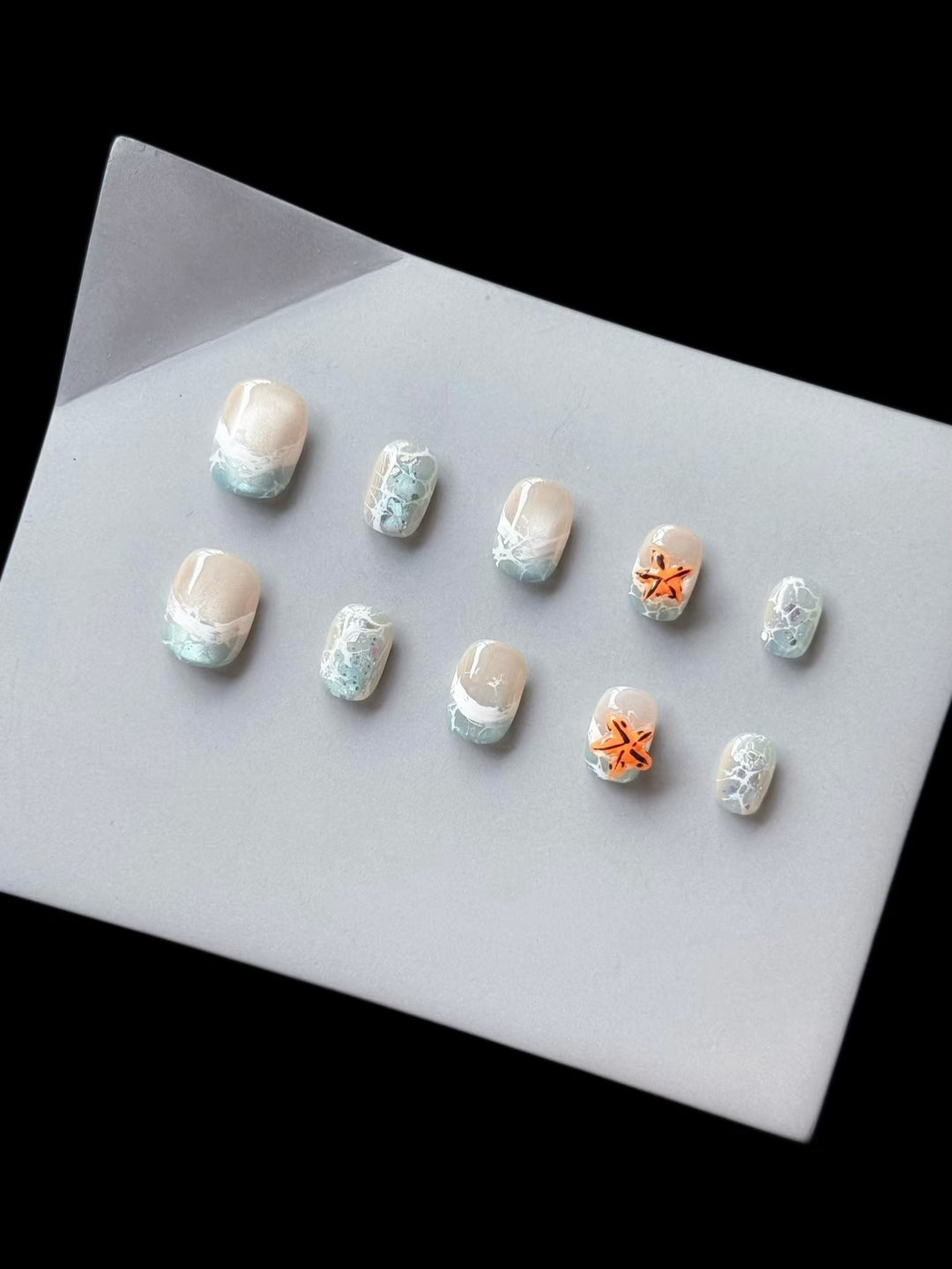 Elegantes Press-On Nagelkunst-Set mit ozean-inspiriertem Design