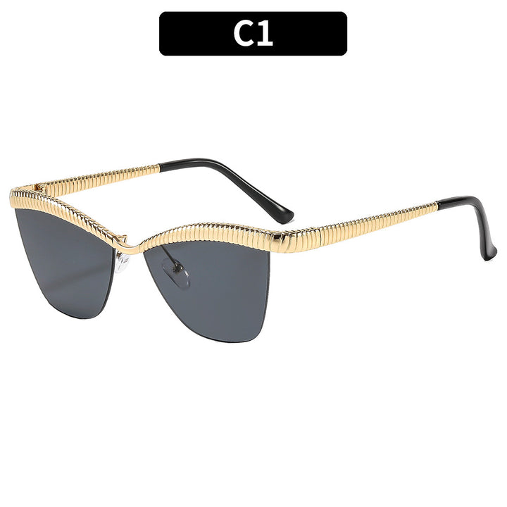 Stylische Katzenaugen-Sonnenbrille mit einzigartigem strukturiertem Rahmen