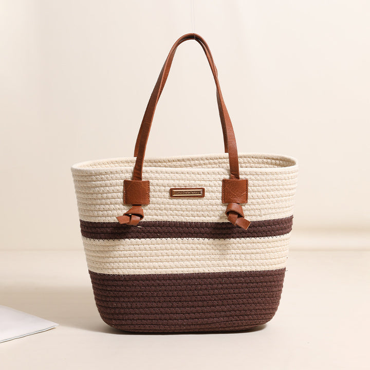Damen Handtasche aus strukturiertem Naturmaterial mit braunen Lederriemen Karnz