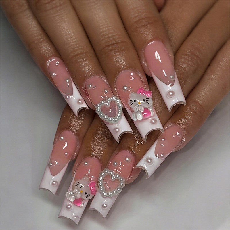 Glamouröses Kunstnagelset mit funkelnden Strassverzierungen und kreativen Tiermotiven Karnz