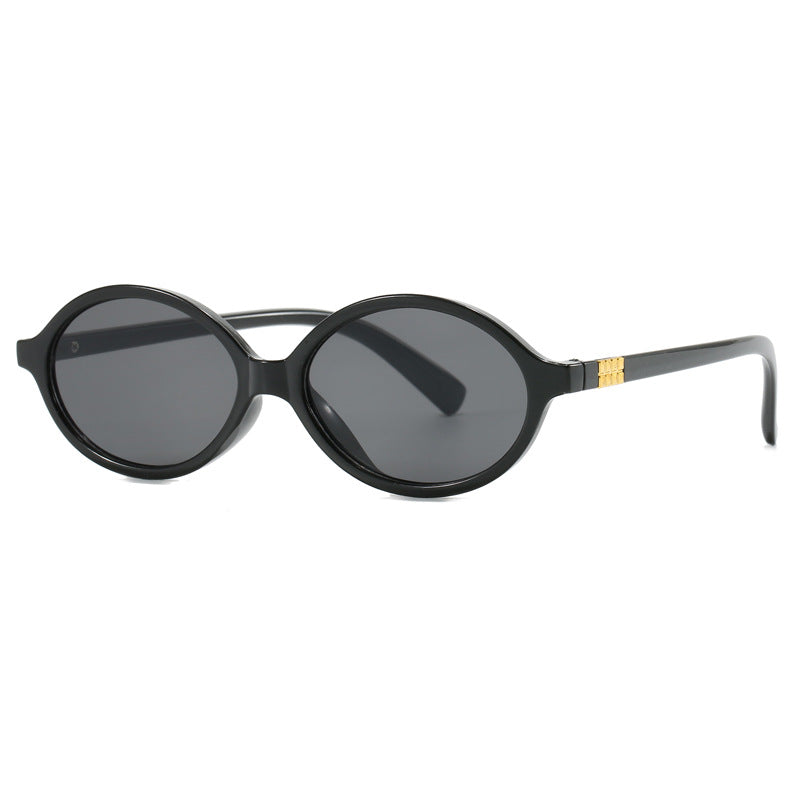 Damen modische Sonnenbrille mit ovalem Rahmen und goldenen Akzenten Karnz
