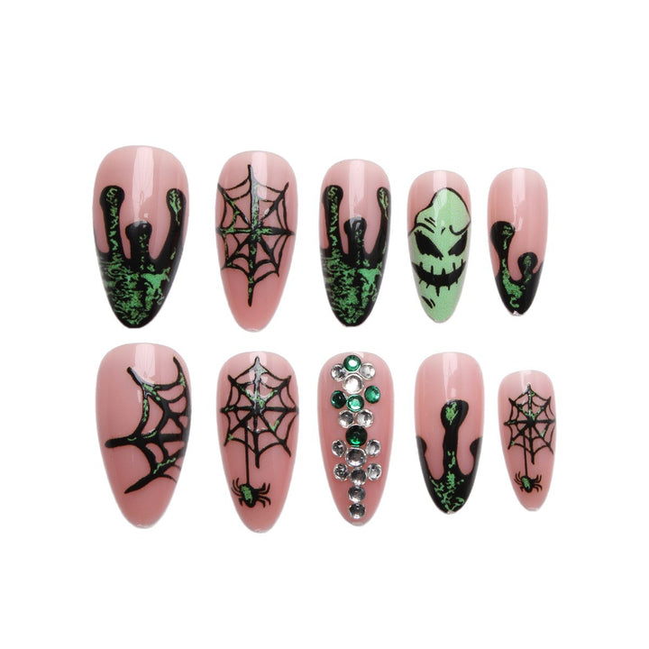 Kunstnägel mit Halloween-Spider-Design und Glitzerakzenten Karnz