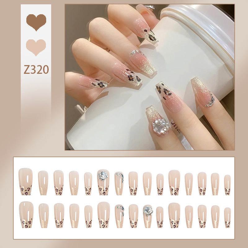 Kunstnagelset mit Glitzer- und Leopardenmotiv Karnz
