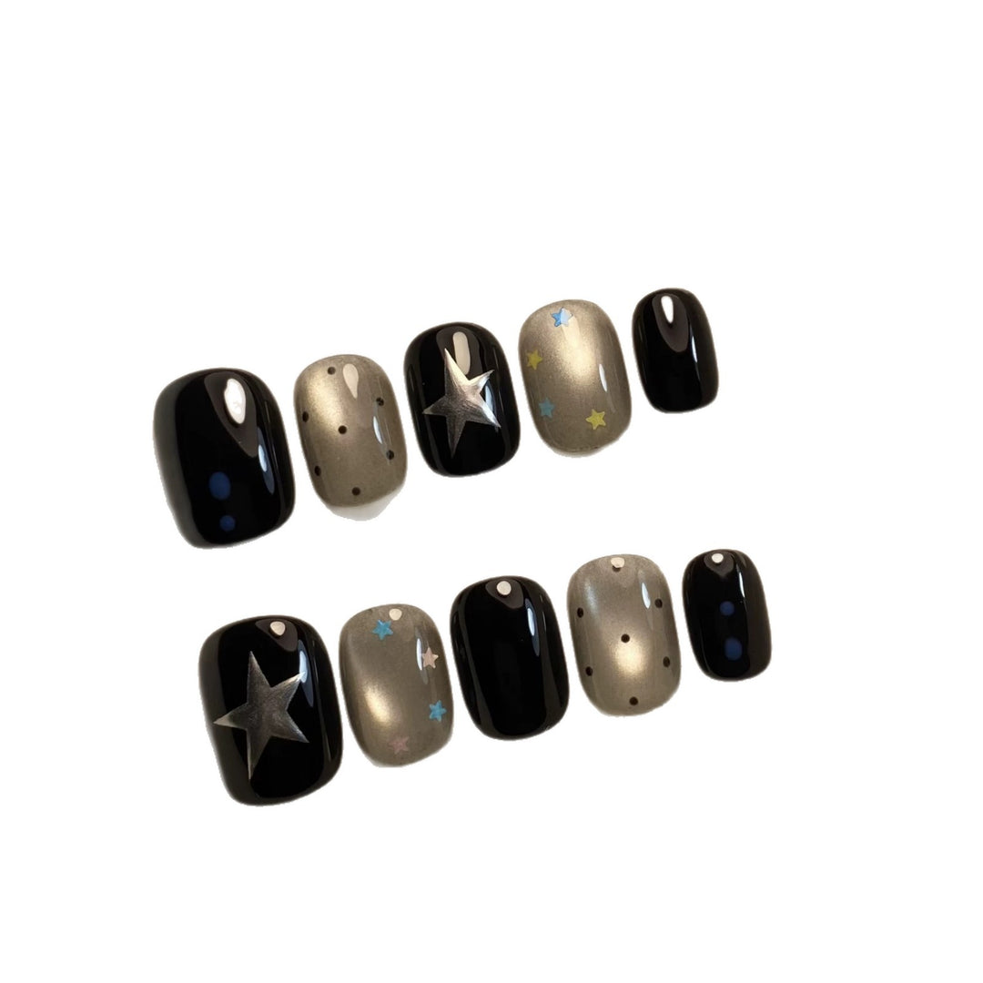 Künstlerisches Press-On Nagelset mit himmlischen Designs