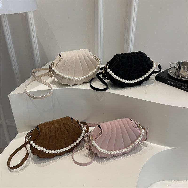 Elegante muschelförmige Umhängetasche Karnz