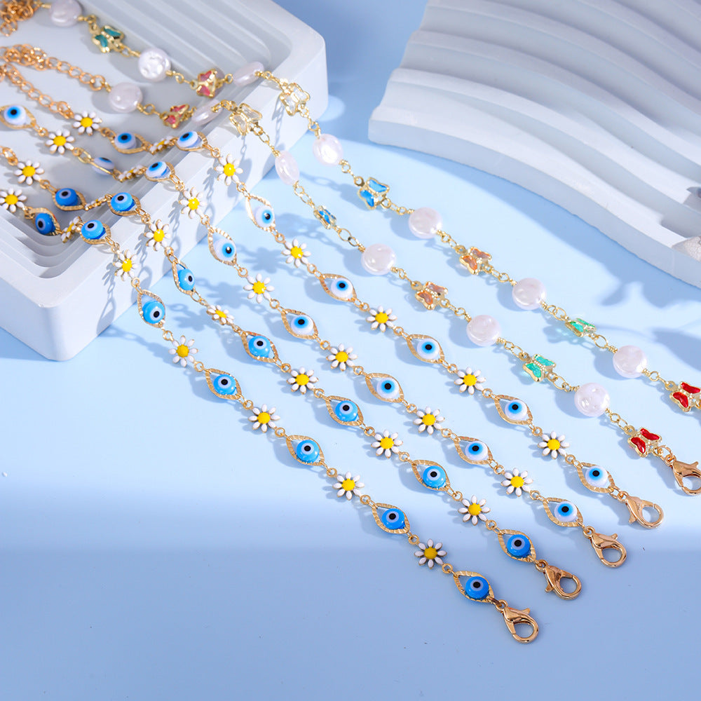 Eye Charm und Daisy Armband Karnz
