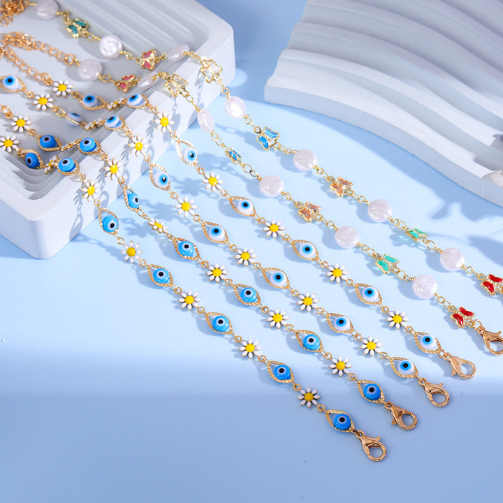 Eye Charm und Daisy Armband Karnz