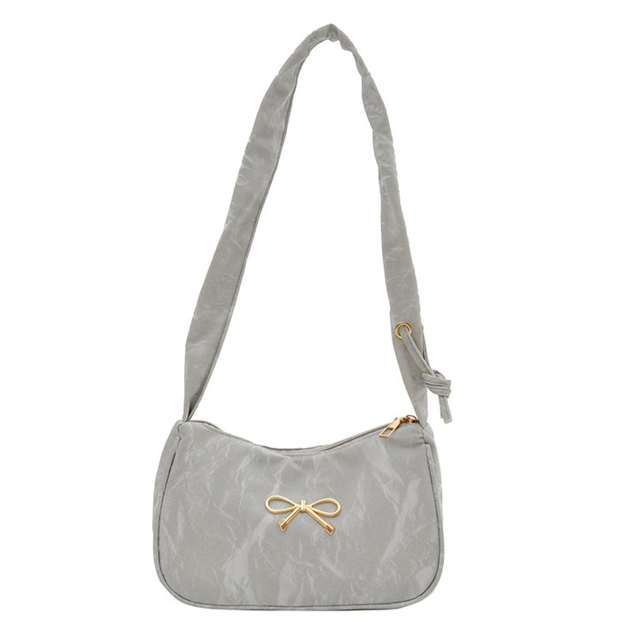 Elegante Schultertasche mit Schleifenverzierung