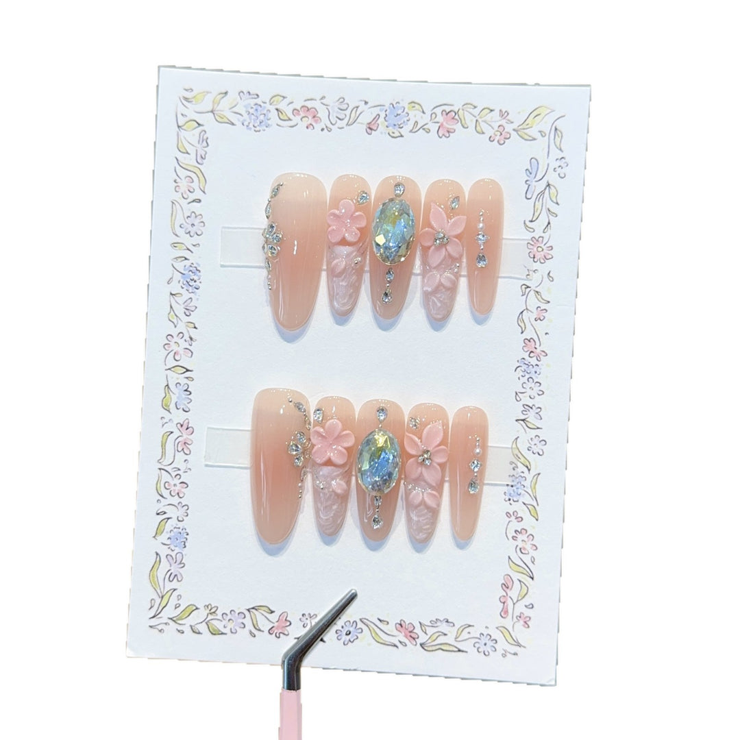 Künstliche Kunstnägel mit Floralen Verzierungen und Glitzerdetails Karnz