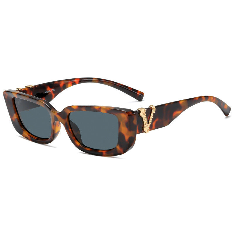 Damen Modische Sonnenbrille mit luxuriösem Tortoise-Design und goldenen Akzenten Karnz