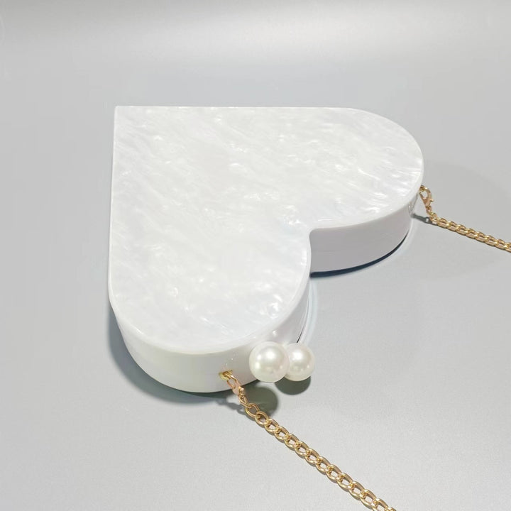 Herzförmige Acryl-Clutch-Tasche