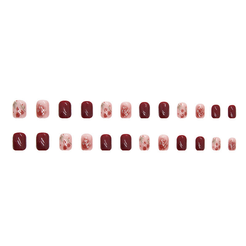 Floral-Design Press-On Nagelset mit Edelsteinakzenten