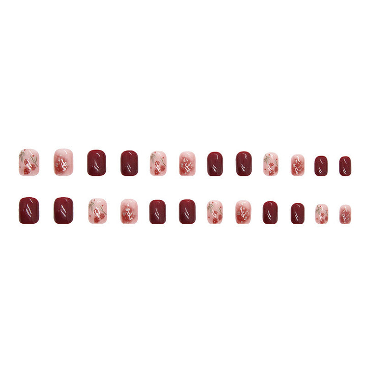 Floral-Design Press-On Nagelset mit Edelsteinakzenten