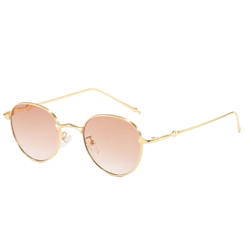 Damen elegante runde Sonnenbrille mit modischem Metallrahmen Karnz