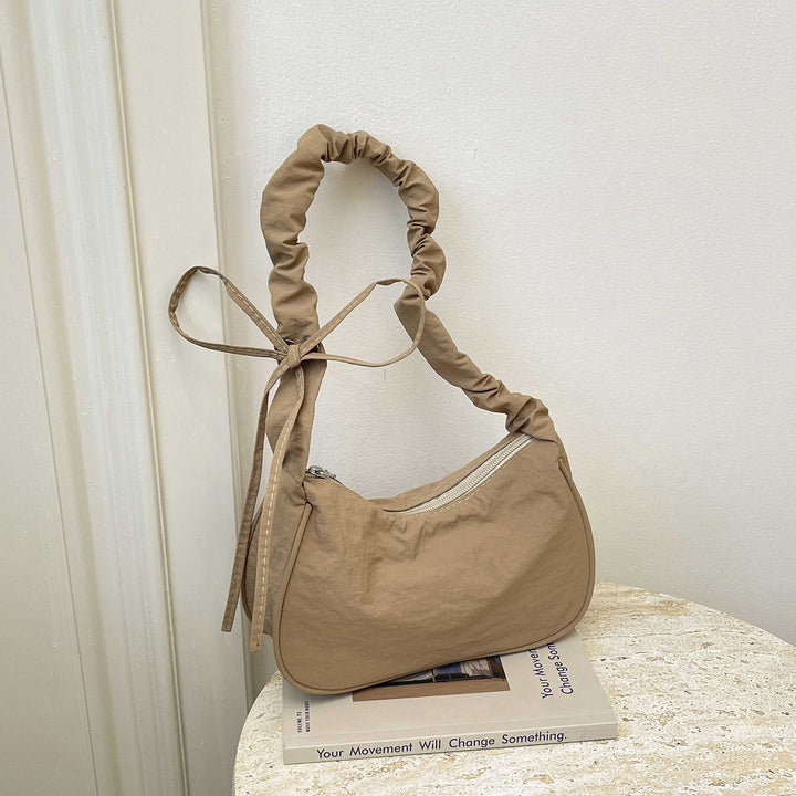 WoTexturiertes Stoff Sling Bag Karnz