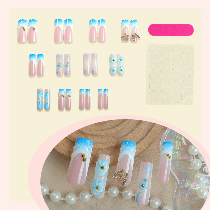 Künstlerisches Press-On-Nagel-Set mit floralen und Schmetterlingsdesigns Karnz