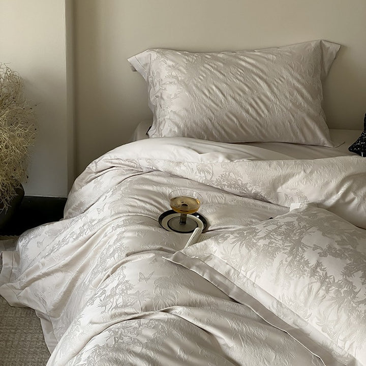 Luxuriöse Bettwäsche-Garnitur aus Jacquard-Satin mit floralem Reliefmuster