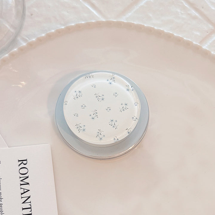 Eleganter und funktionaler Untersetzer mit floralem Design Karnz