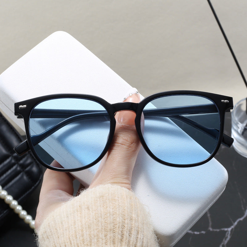 Damen modische Sonnenbrille mit transparentem Rahmen und elegantem Design Karnz