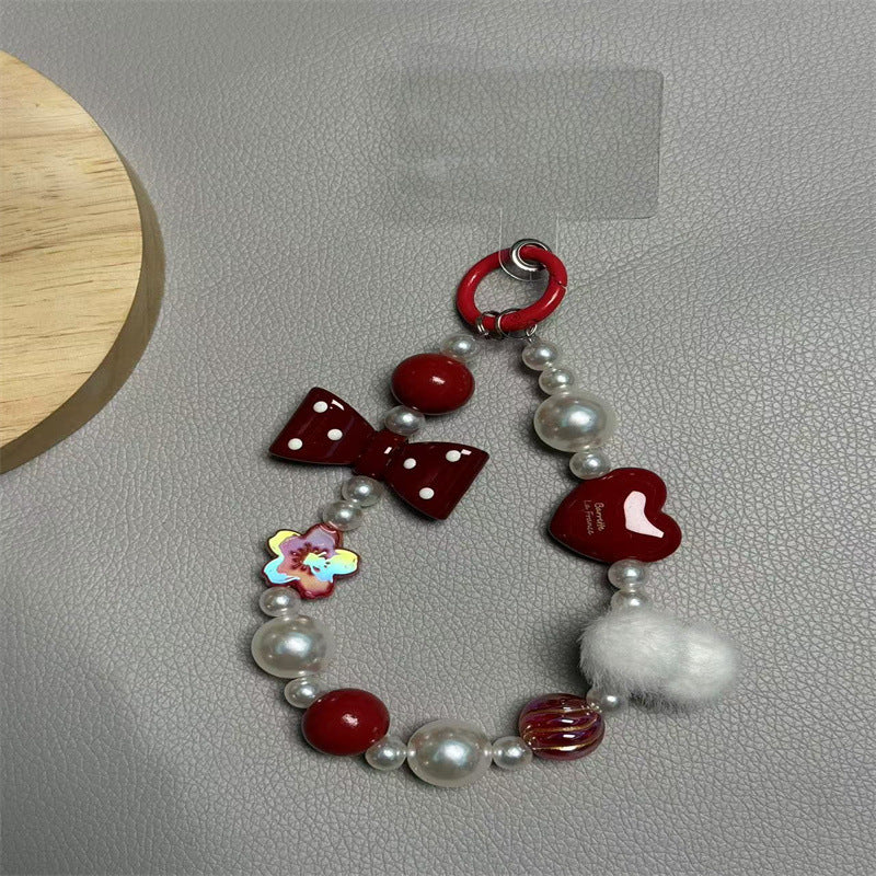 Verspielter Bow and Heart Schlüsselanhänger Karnz