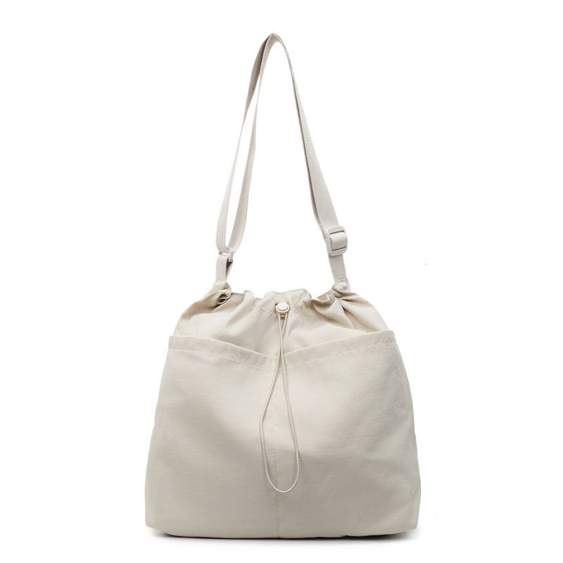 Kordelzugverschluss Utility Schultertasche