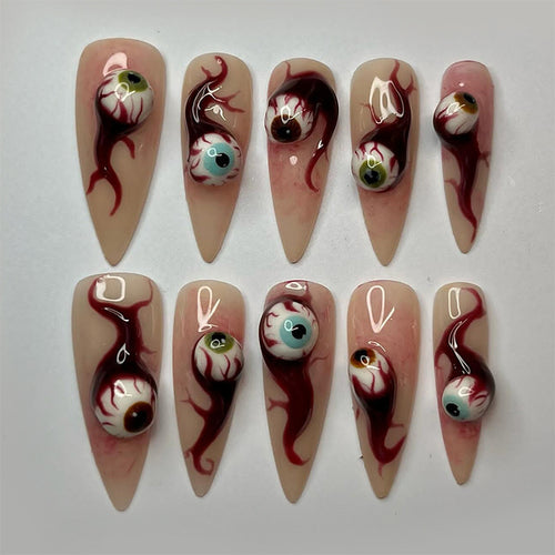 Kunstnagelset mit kreativen Augen-Design Karnz