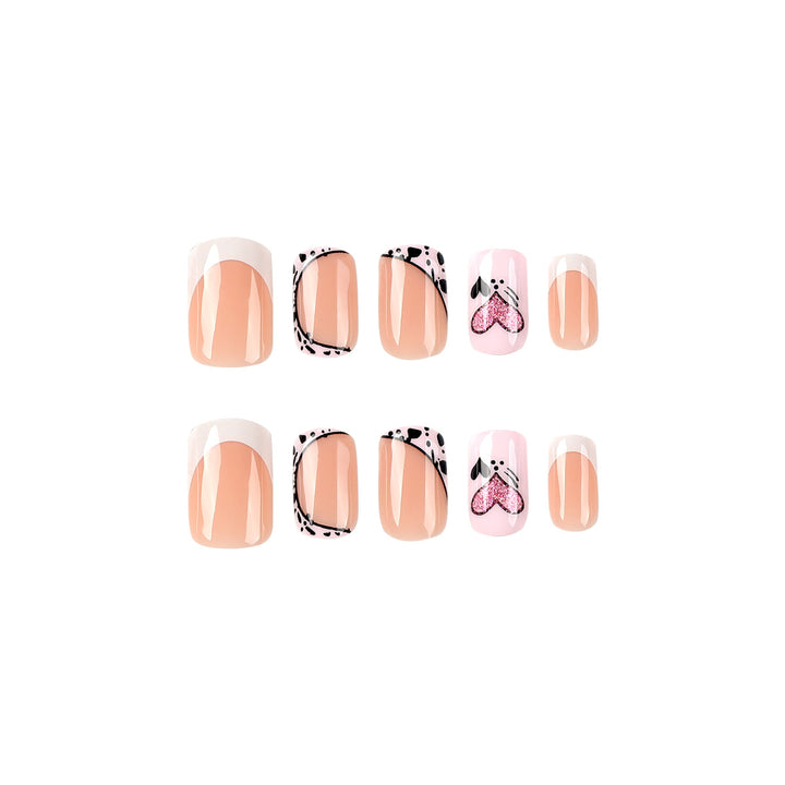 Kunstvolle Nagelkunst mit Herz- und Tiermotiven Karnz