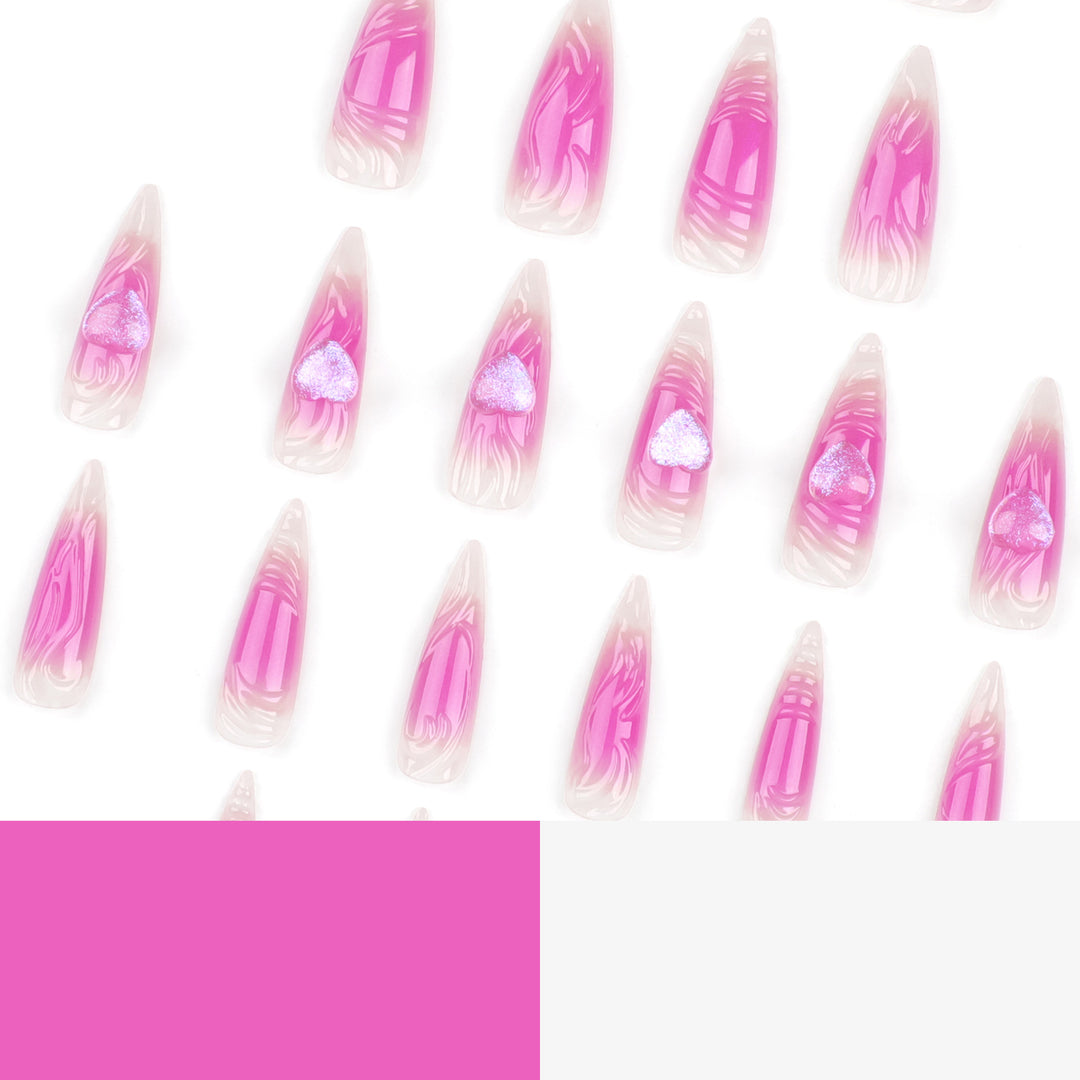 Kunstvolle Stiletto-Nägel mit Herz-Design und Glitzerakzenten Karnz