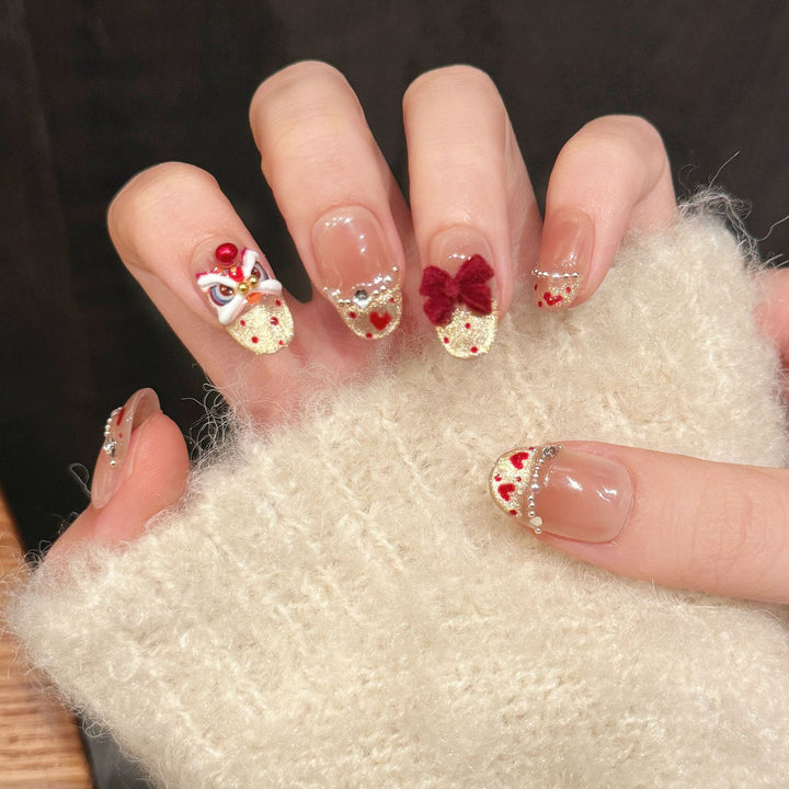 Dekoratives Press-On Nagelkunstset mit verzierten Blumen- und Edelsteinelementen