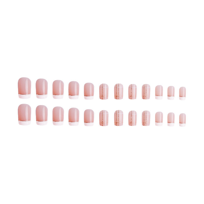 Kunstnagelset mit elegantem French-Tip und modischen Verzierungen Karnz