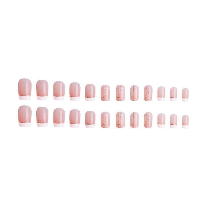 Kunstnagelset mit elegantem French-Tip und modischen Verzierungen Karnz