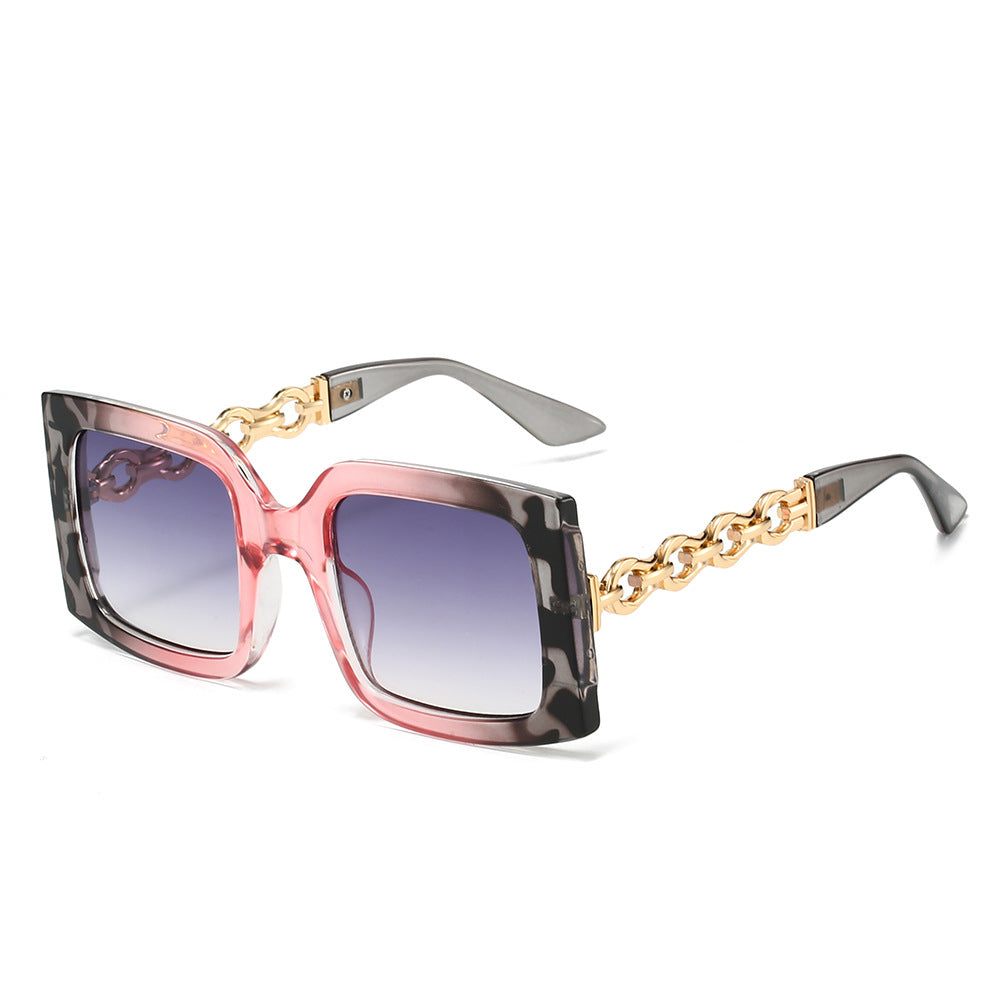 Damen elegante Sonnenbrille mit luxuriösen Kettendetails Karnz