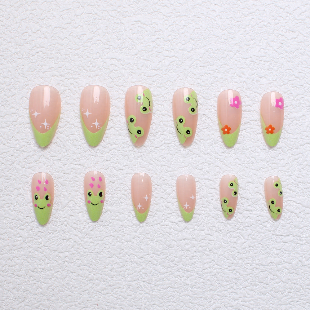 Kunstnagelset mit kreativen Froschmotiven und verspielten Akzenten Karnz