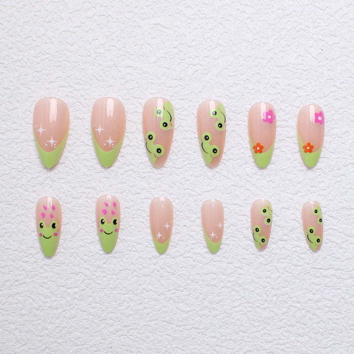 Kunstnagelset mit kreativen Froschmotiven und verspielten Akzenten Karnz