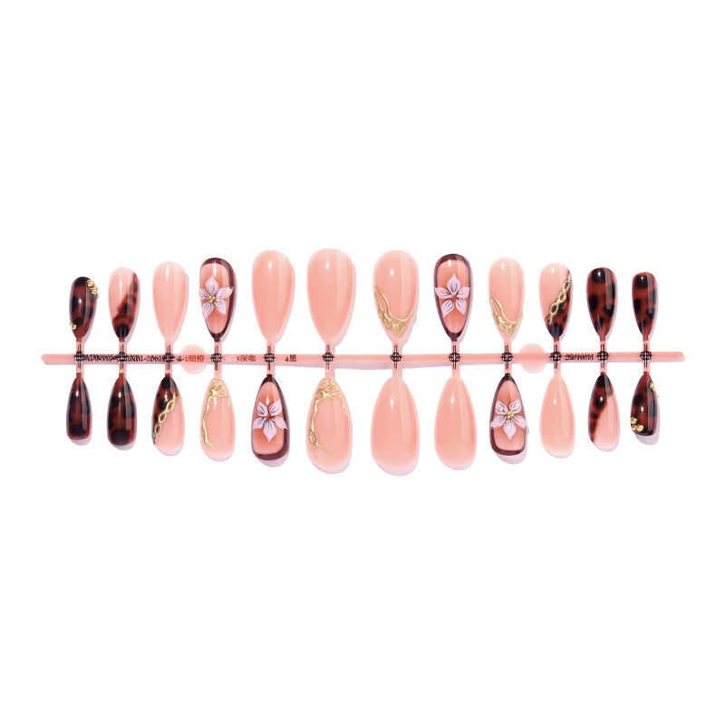 Künstlerisches Press-On-Nagelset mit eleganten Blumen- und abstrakten Designs Karnz