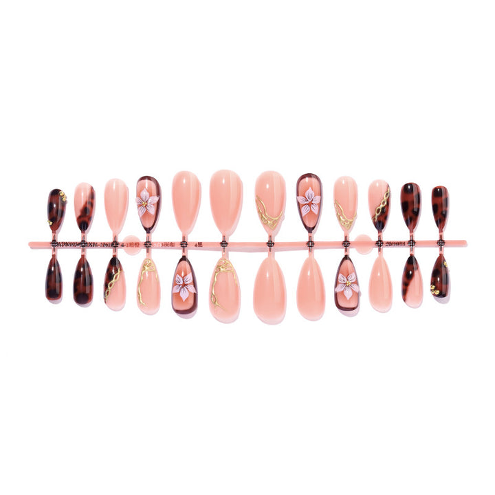 Künstlerisches Press-On-Nagelset mit eleganten Blumen- und abstrakten Designs Karnz