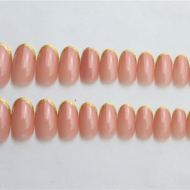 Elegantes Glossy Press-On Nagelset mit goldenen Akzenten