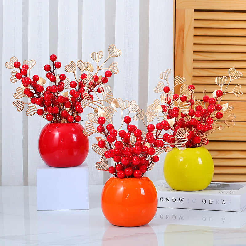 Herzförmige dekorative Blumenarrangement