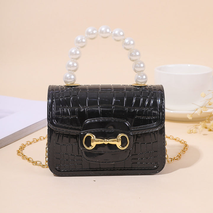 Damen elegante Handtasche mit Perlenhenkel und strukturiertem Design Karnz
