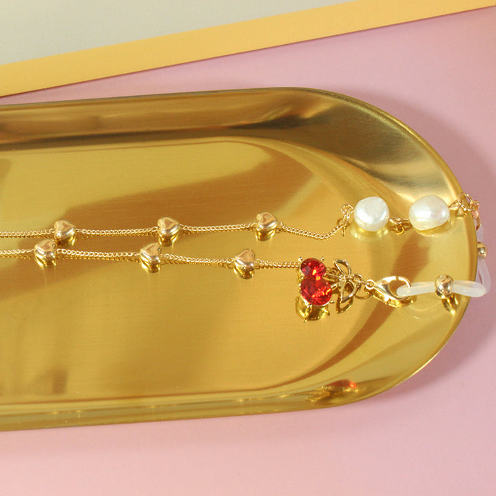 Elegantes Schmuckband mit Perlen und Silbernen Akzenten Karnz