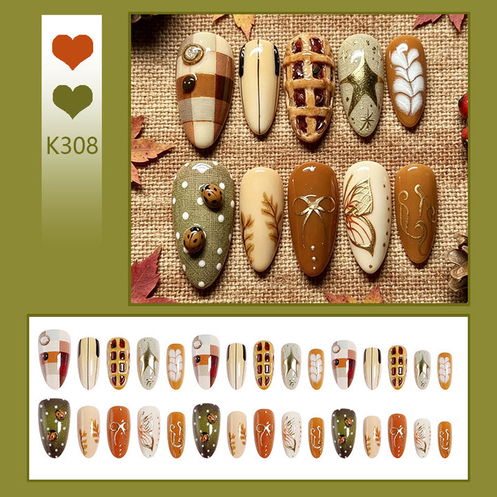 Kunstnagelset mit handgefertigten botanischen Mustern und eleganten Akzenten Karnz