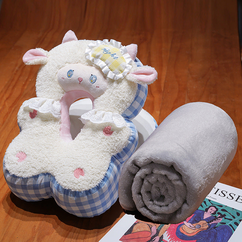Schafförmiges Nackenkissen mit kompakter Kuscheldecke