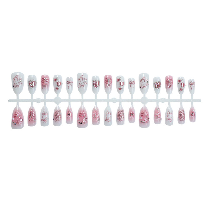 Dekoratives Press-On Nagelkunst-Set mit eleganten floralen und Edelstein-Akzenten Karnz
