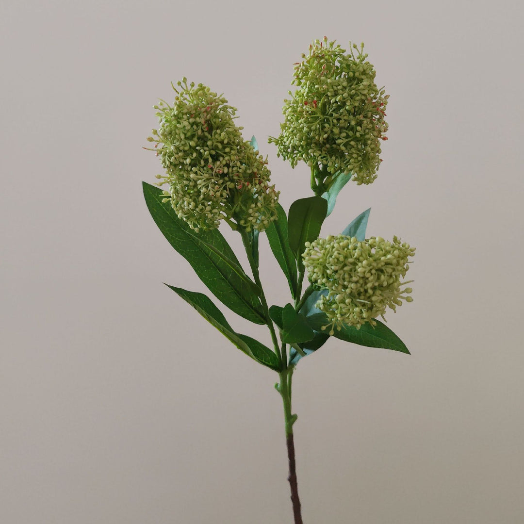 Lebensechte Blumenstängelarrangement