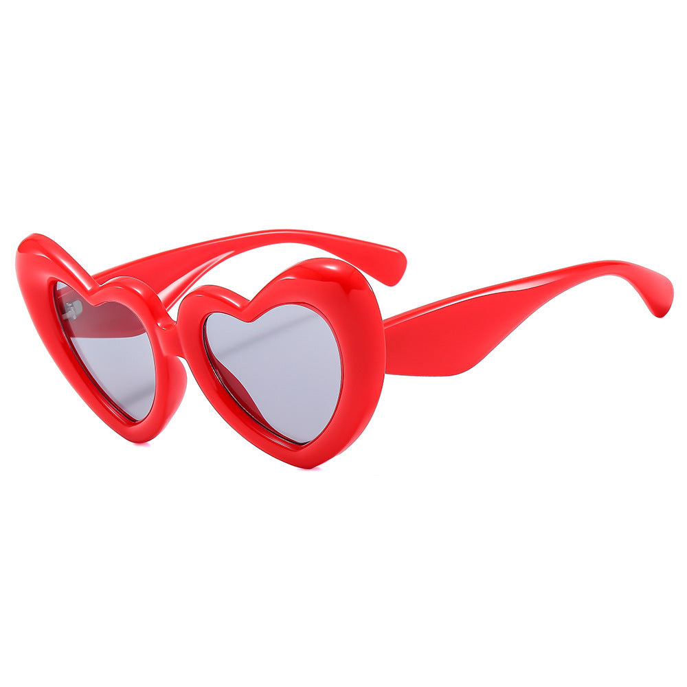 Damen Herzförmige Sonnenbrille mit stylischem Rahmen Karnz