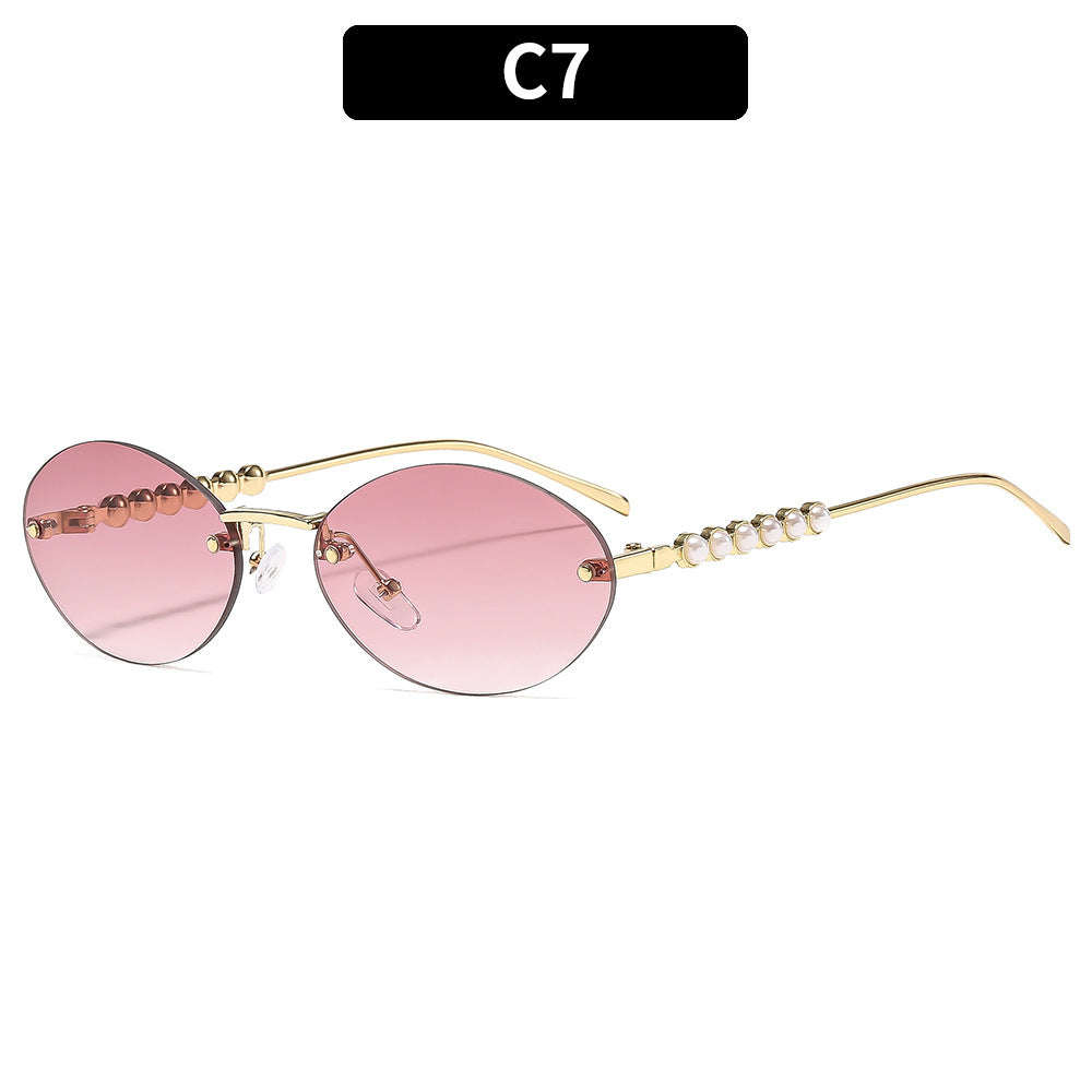 Elegante ovale Rahmen-Sonnenbrille mit dekorativen Perlenakzenten