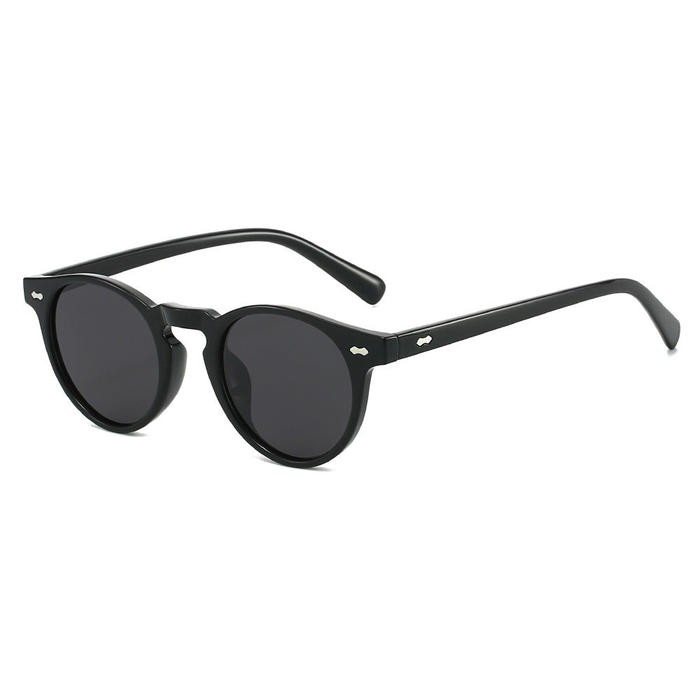 Damen Vintage Sonnenbrille mit runden Gläsern und transparentem Rahmen Karnz