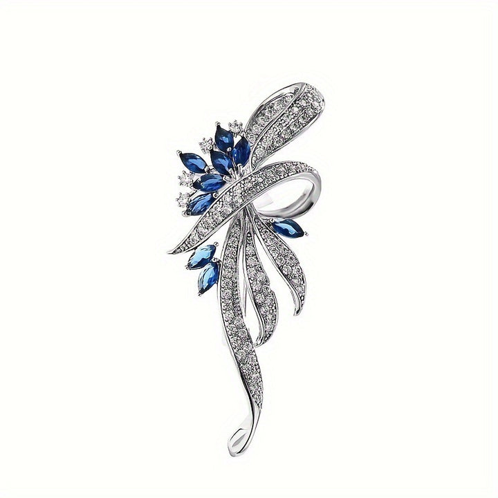Exquisite Brosche mit Funkelnden Zirkonia und Blauen Edelsteinen Karnz