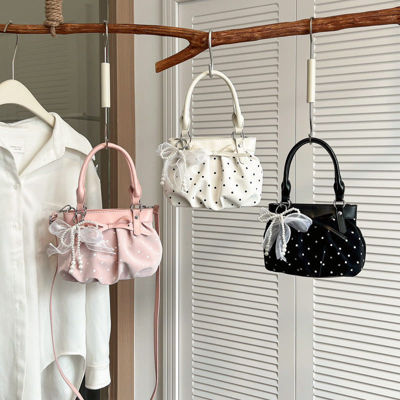 Stylische Pünktchen-Handtasche